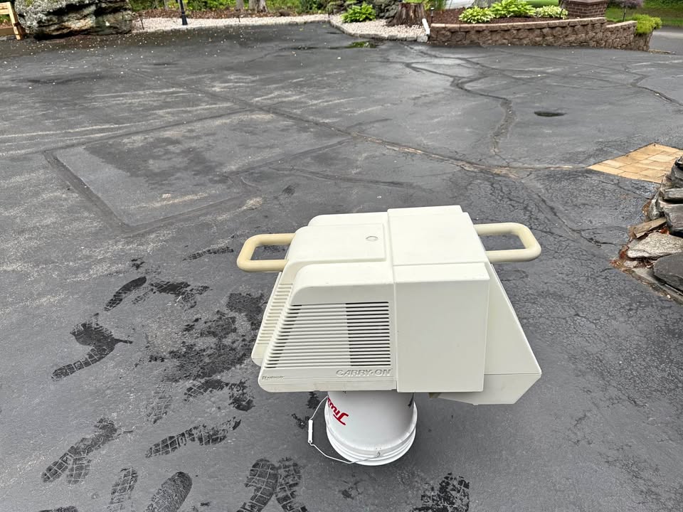 Portable, marine air conditioner with cover.