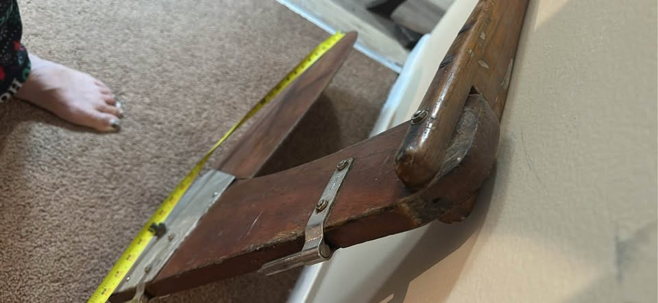 a wooden sailboat rudder and tiller assembly