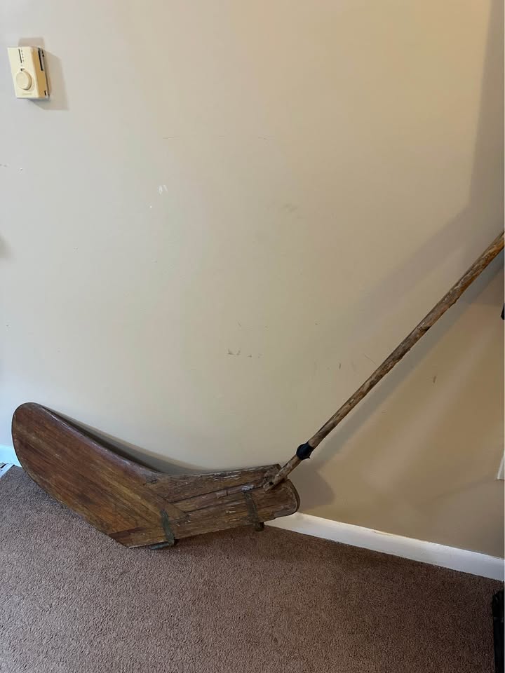 a wooden sailboat rudder and tiller assembly