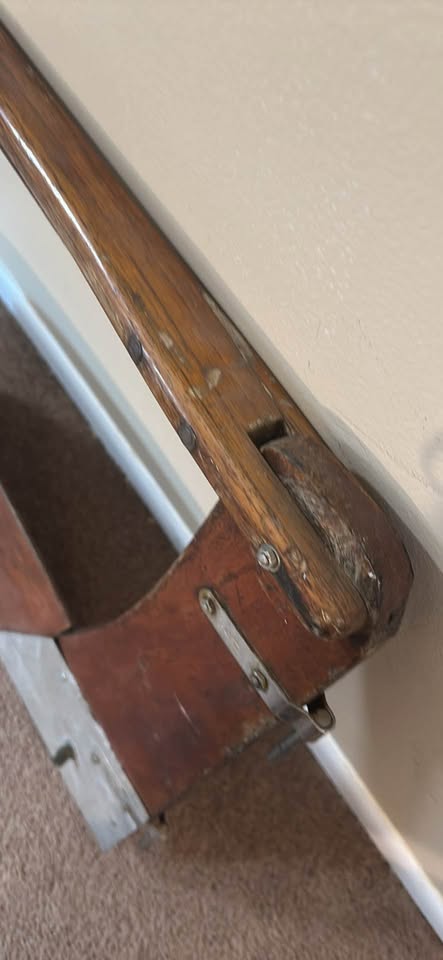 a wooden sailboat rudder and tiller assembly