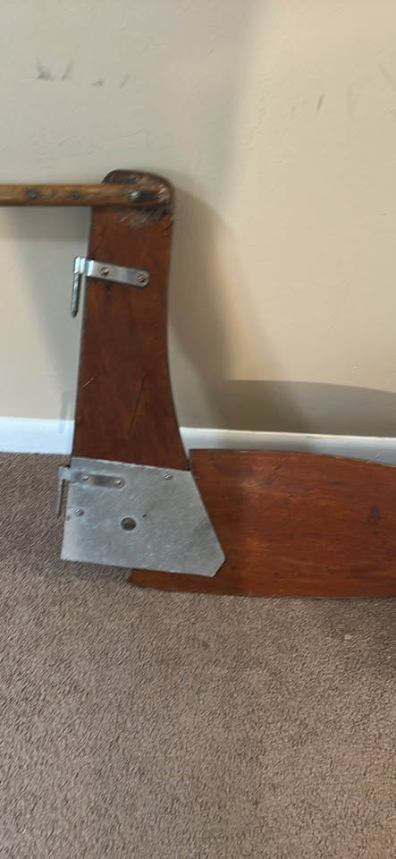 a wooden sailboat rudder and tiller assembly